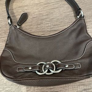 Wilsons Leather small brown purse.  Inside zip pocket. Fits wallet, keys, phone.